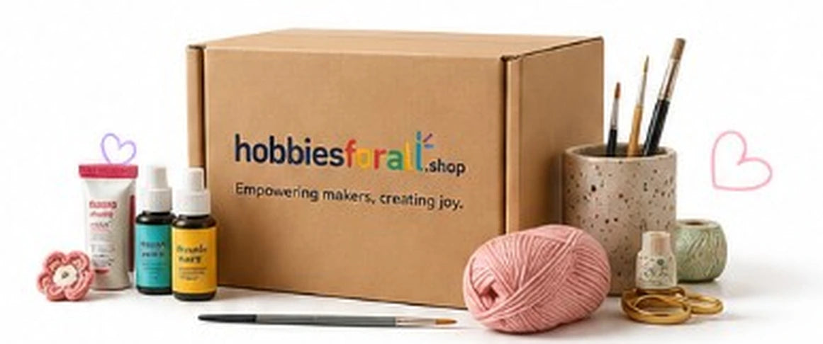 A HobbiesForAll delivery box surrounded by creative supplies